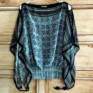 Sheer blouse with sleeveless lining